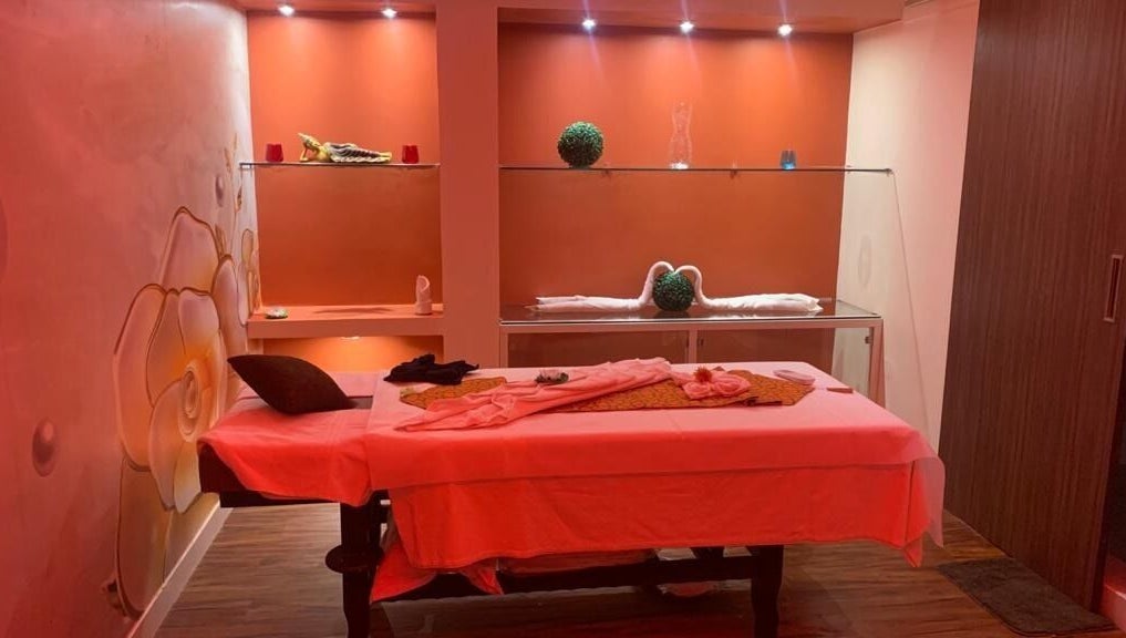 Tranquil massage room at Hasta Spa Anna Nagar in Chennai, Tamil Nadu, IN with soft lighting and decor.