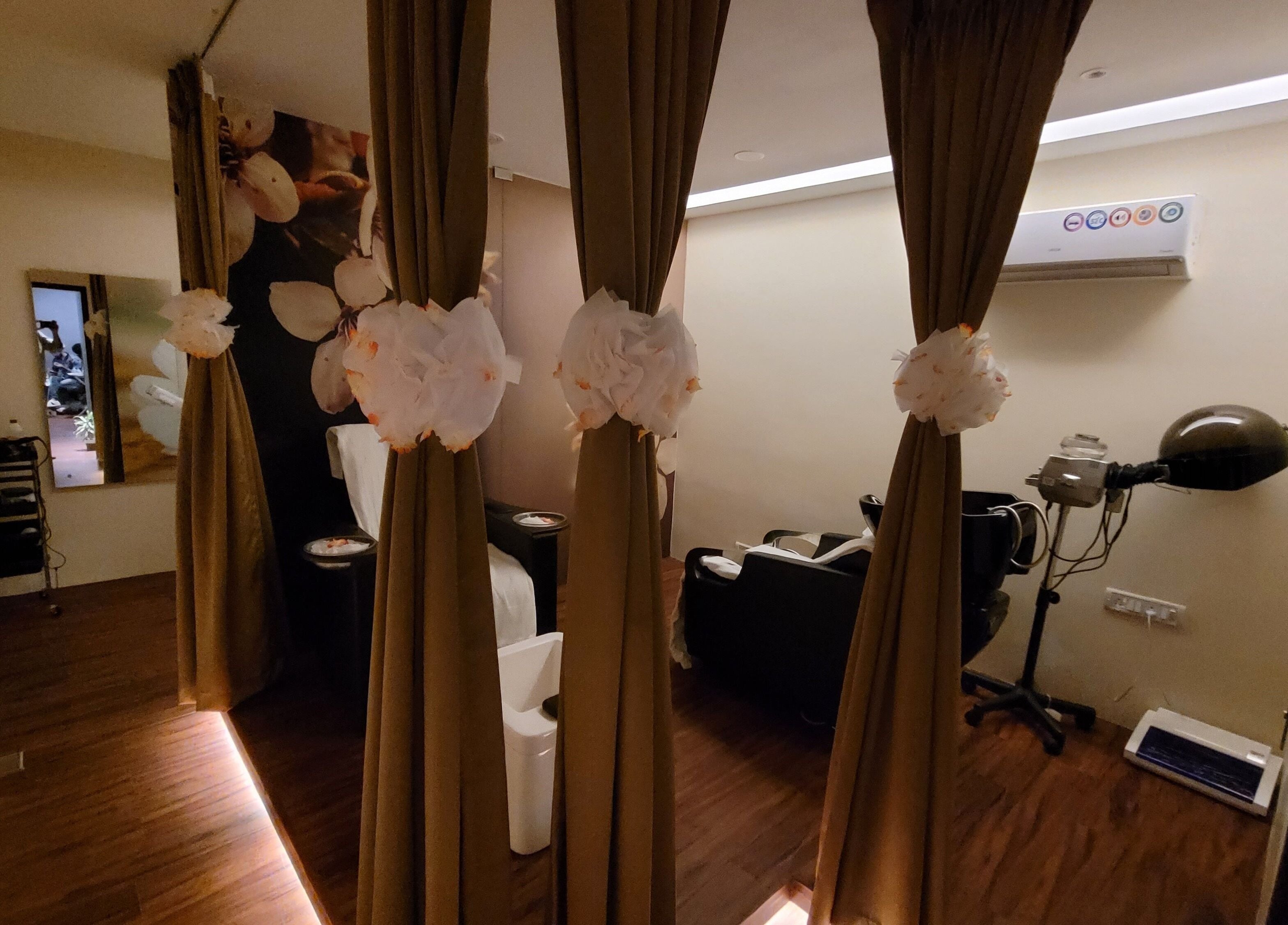 Elegant treatment room at Hasta Spa Anna Nagar, Chennai, Tamil Nadu, IN, featuring calming decor and ambiance.