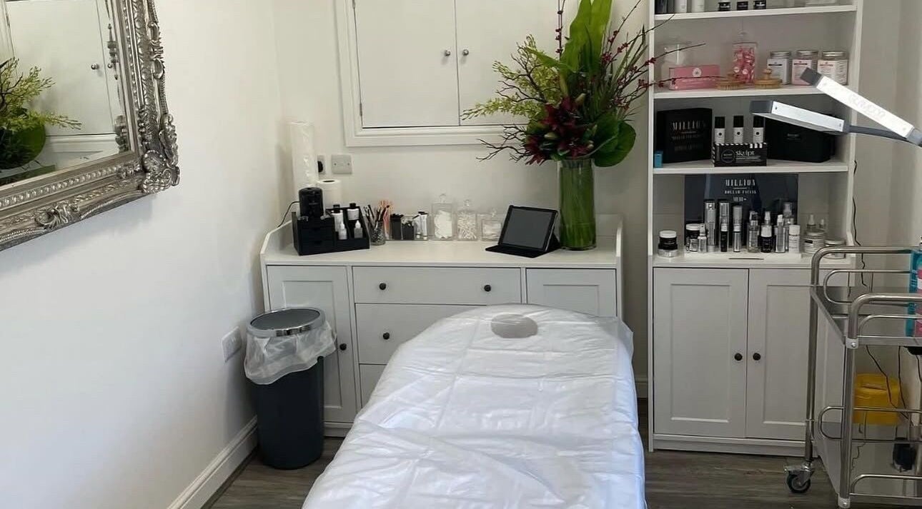 Treatment room at Keighley, GB with a massage table and beauty products.