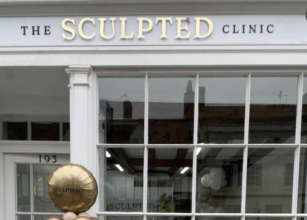 Front view of The Sculpted Clinic in Towcester, England, GB with gold balloon decor.