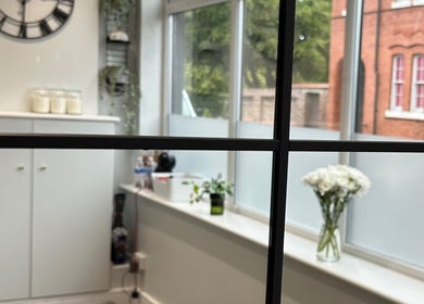 Calming interior of IB Beauty & Aesthetics in Newton-le-willows, England, GB with modern decor and natural light.