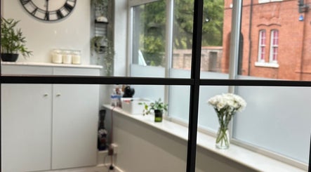 Calming interior of IB Beauty & Aesthetics in Newton-le-willows, England, GB with modern decor and natural light.