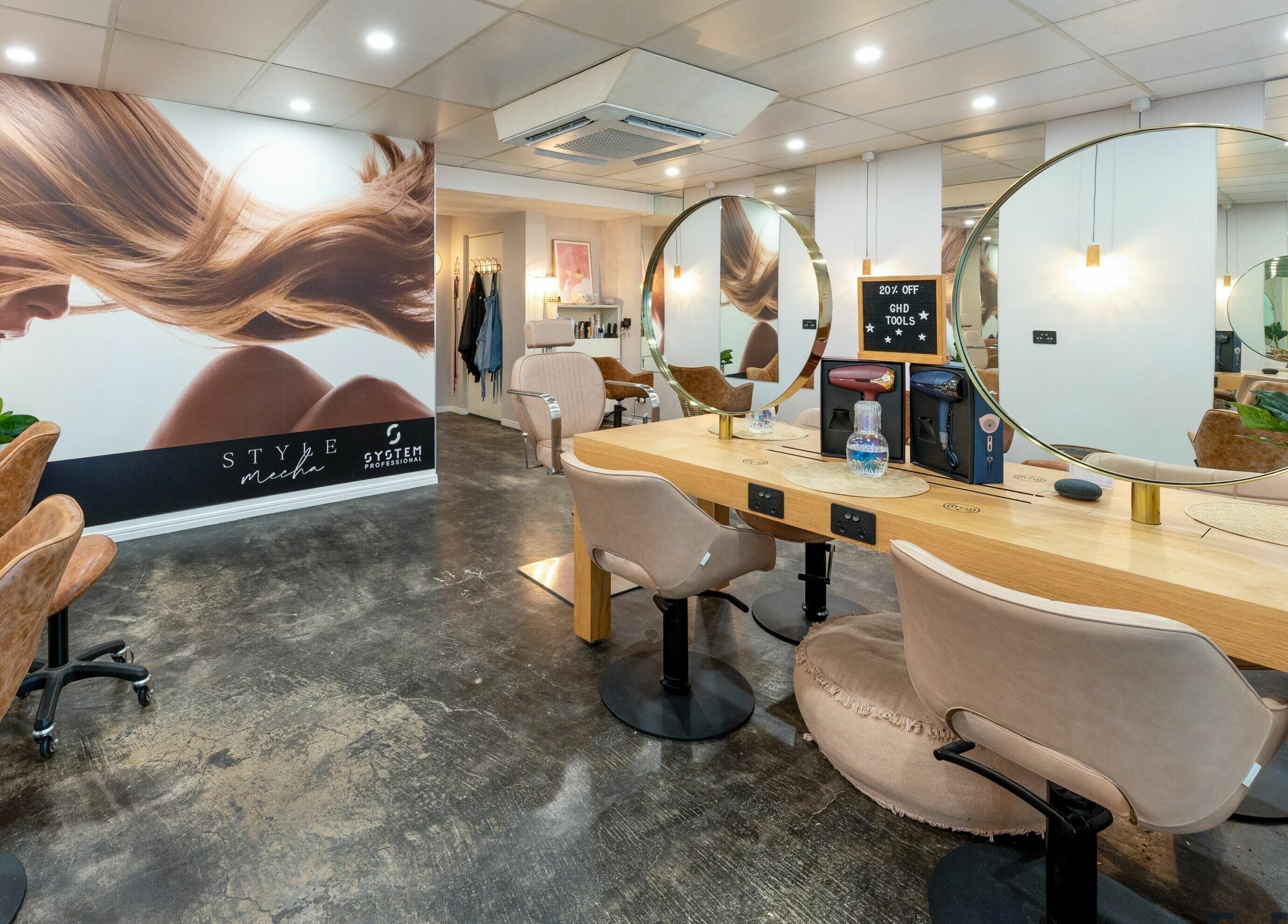 Style Mecha salon interior in Thorneside, Queensland, AU featuring elegant chairs and mirrors.