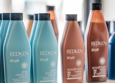 Redken hair products on display at New Sensations Hairstyling in Melbourne, Victoria, AU.