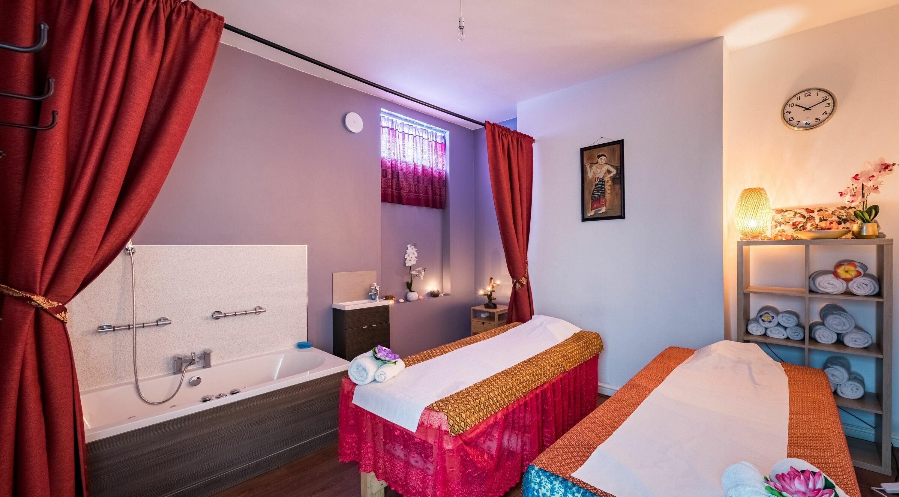 Relaxing massage room at Raddaran Thai Massage and Spa, Manchester, England, GB with twin beds and soothing decor.