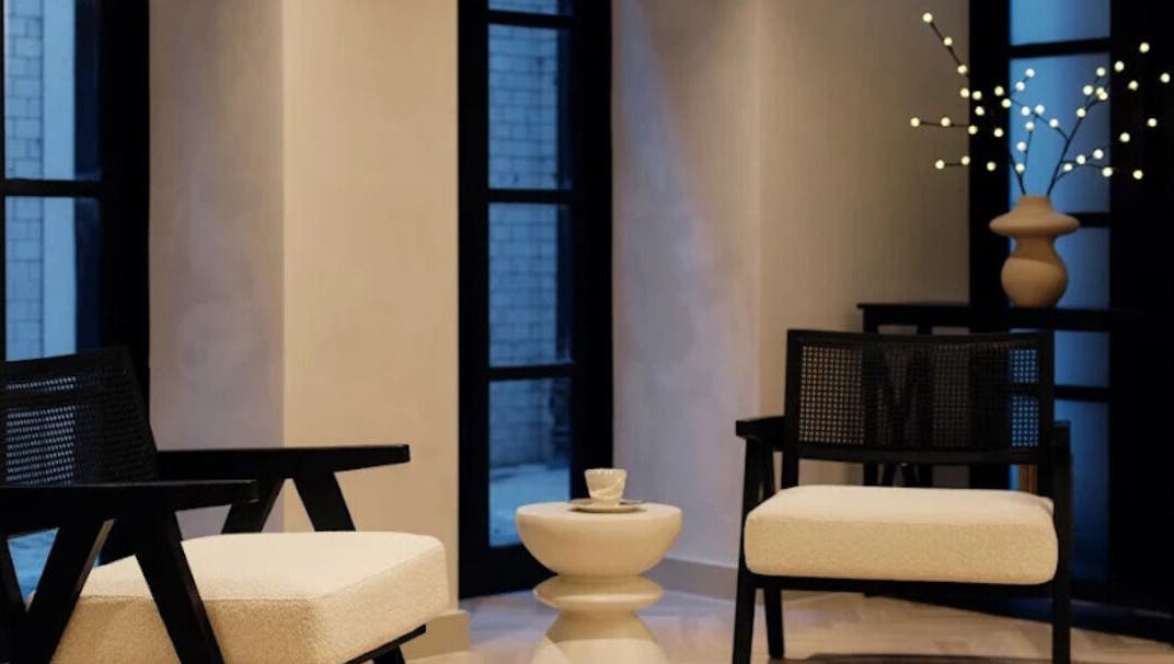 Modern lounge area at Dr Wells Clinic - Medical Aesthetics & Wellness in London, England, GB with elegant seating.