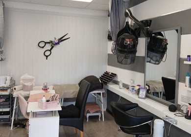 Elegant styling area at Diamonds and Pearls Hair Studio in Northfleet, England, GB with modern decor and equipment.