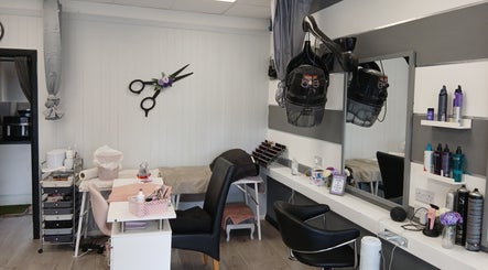 Elegant styling area at Diamonds and Pearls Hair Studio in Northfleet, England, GB with modern decor and equipment.