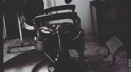 Vintage barber chair at fiVe Hair Barber, Cape Town, Western Cape, ZA. Experience classic style and comfort.