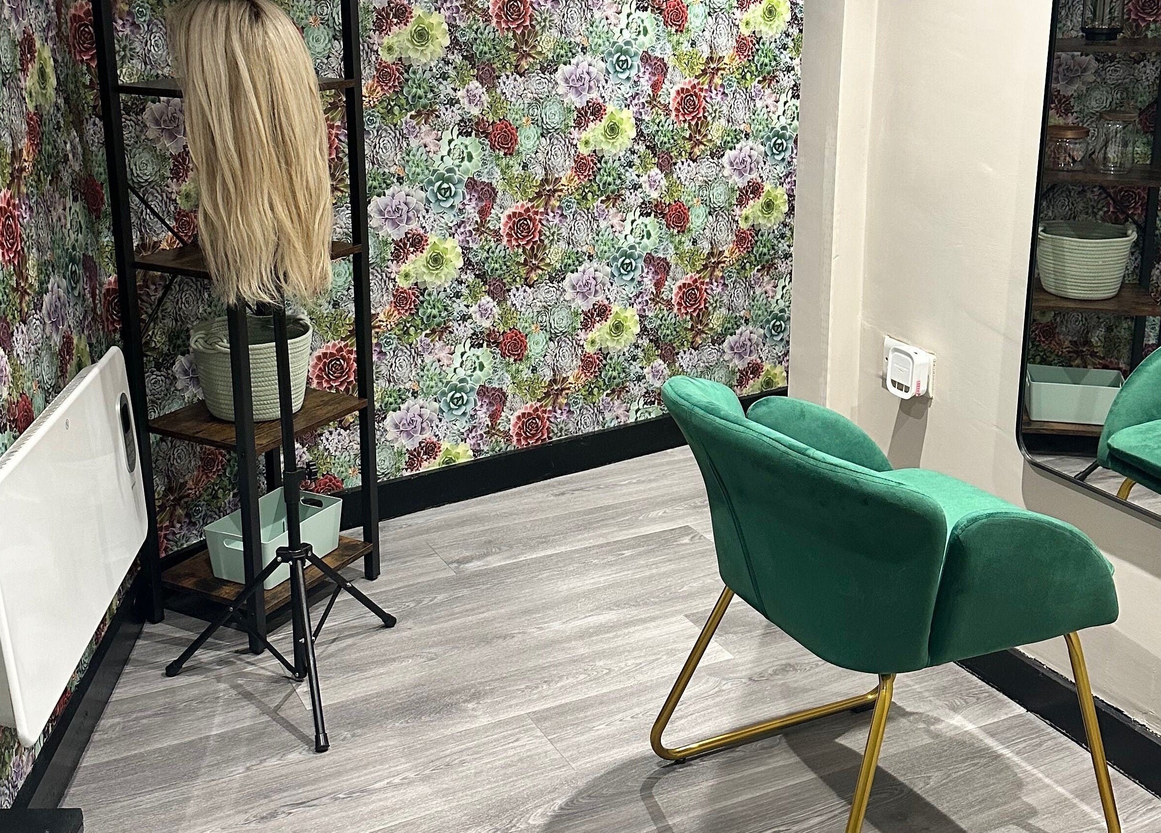 Elegant salon chair and floral decor at The Elite Retreat, Biddulph, SOT, England, GB.