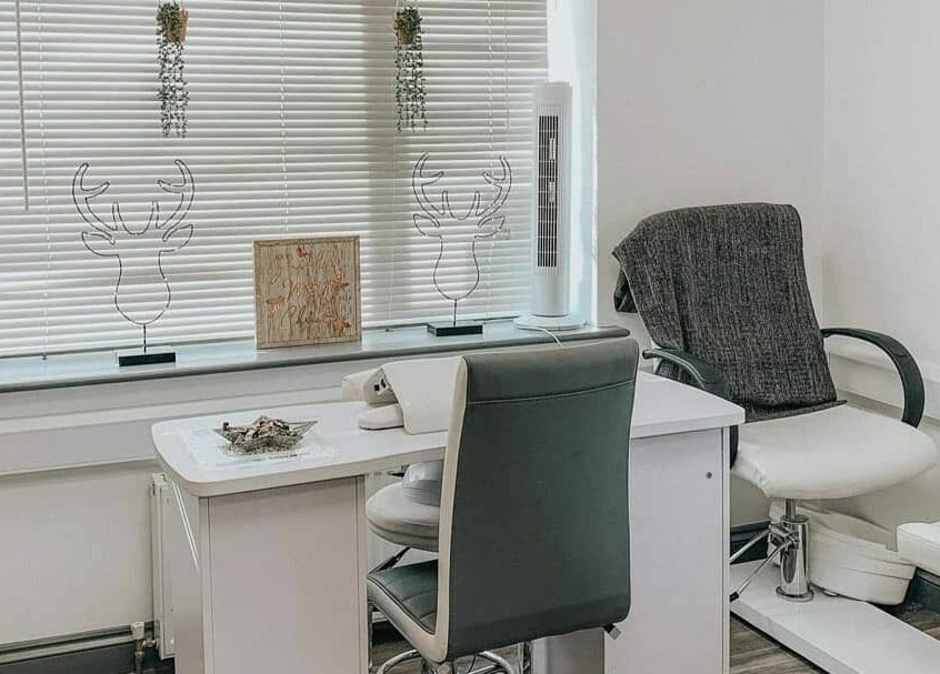 Tranquil therapy space at Remote Therapies, Shillingford, England. Cozy chairs, natural light, and calming decor.