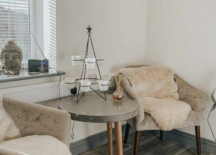 Cozy relaxation corner at Remote Therapies, Shillingford, England, GB with plush chairs and ambient decor.