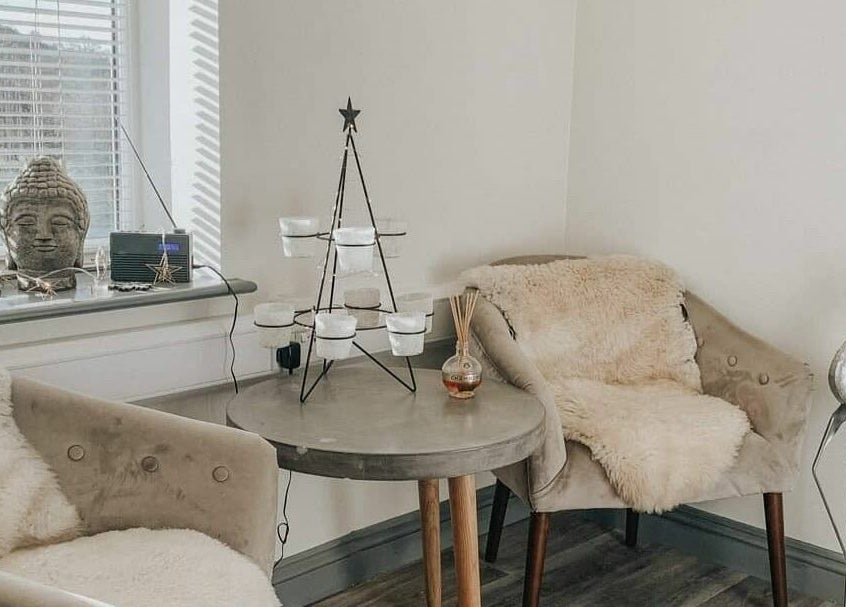 Cozy relaxation corner at Remote Therapies, Shillingford, England, GB with plush chairs and ambient decor.