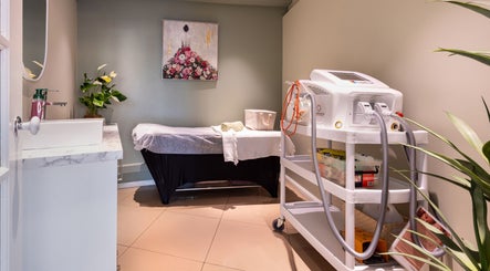 Serene treatment room at Revive Beauty Clinic, Padstow, New South Wales, AU, featuring a spa bed and equipment.