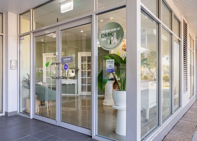 Entrance of Revive Beauty Clinic, Padstow, New South Wales, AU with glass doors and visible interior.