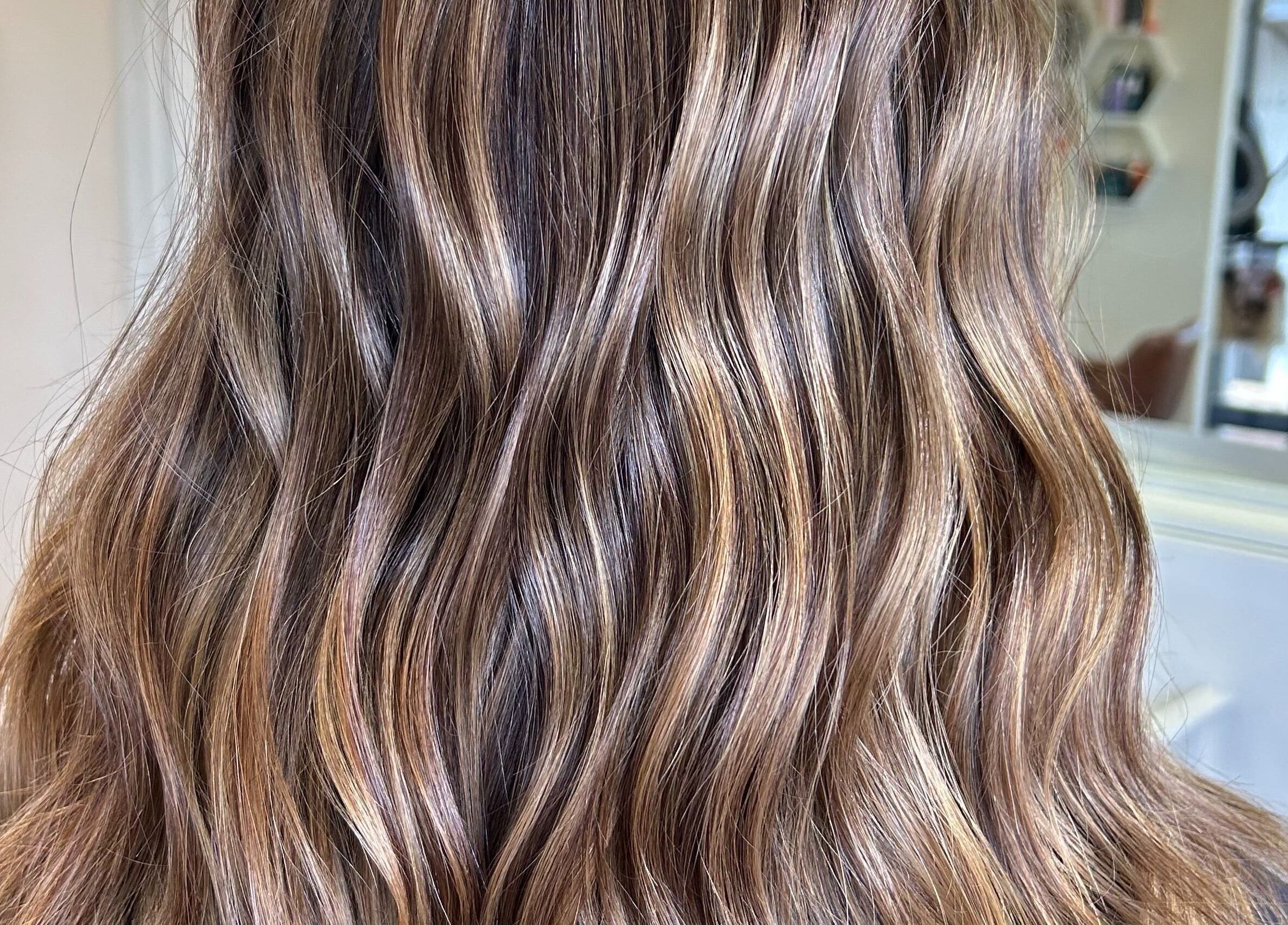Elegant wavy golden-brown hair at Beyond Blonde by Denise Mayberg, Yarrawonga, Northern Territory, AU.