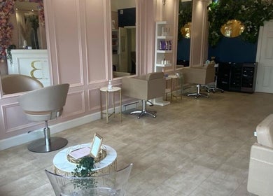 Luxurious seating and mirrors at Bellissima Lounge, Kirkcaldy, Scotland, GB, showcasing modern elegance.