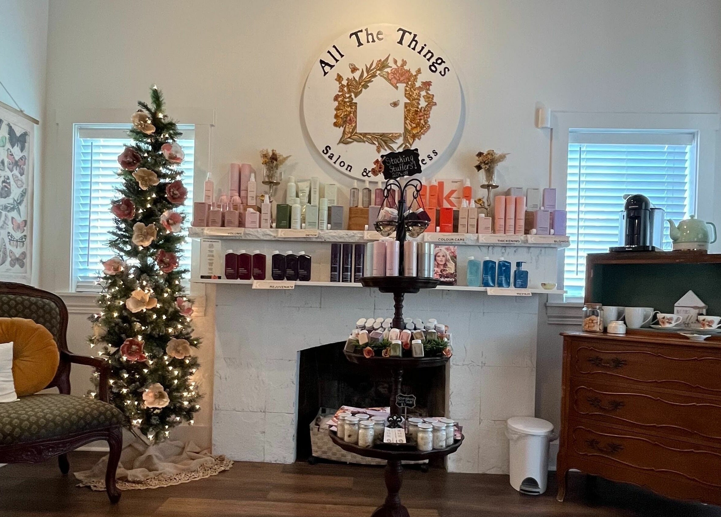 All The Things Salon and Wellness, Fort Myers, Florida showcases a festive, elegant interior with products and decor.