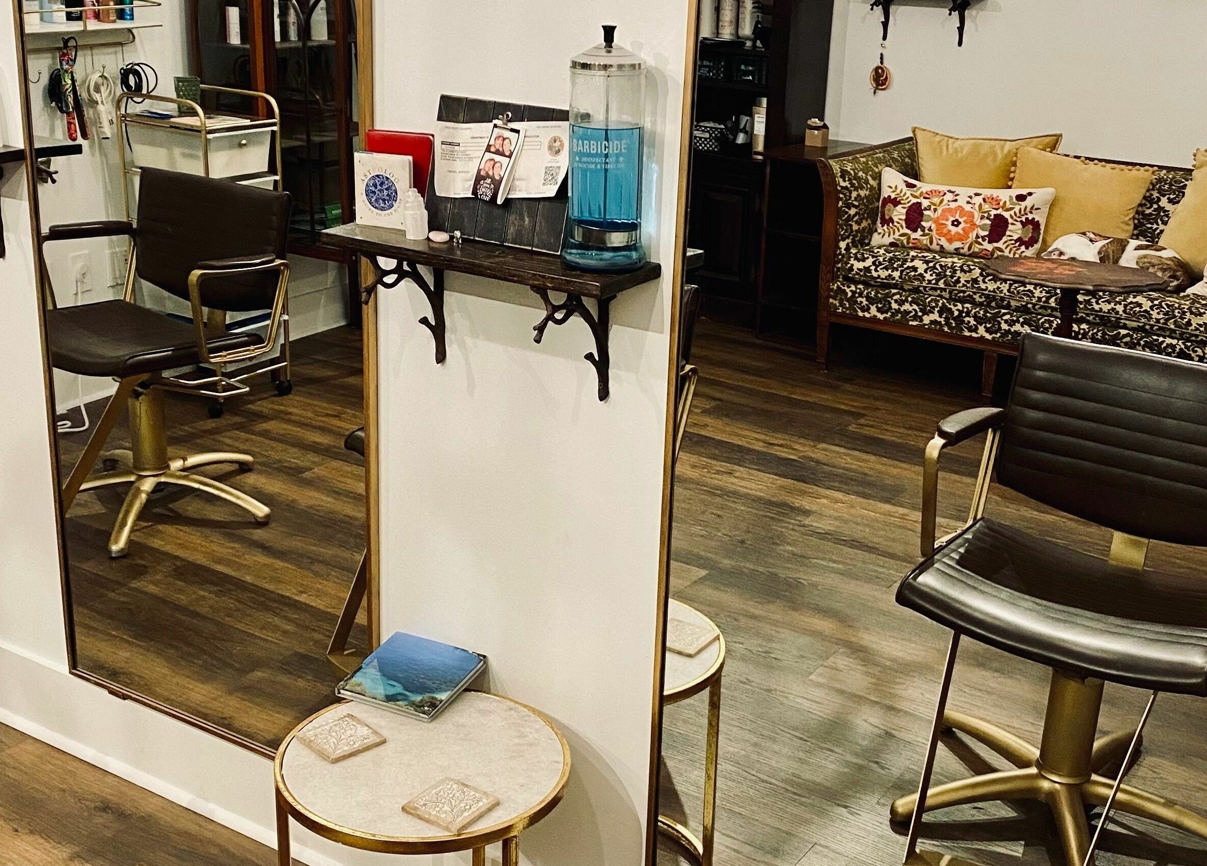 Elegant salon chair and decor at All The Things Salon and Wellness, Fort Myers, Florida, US.