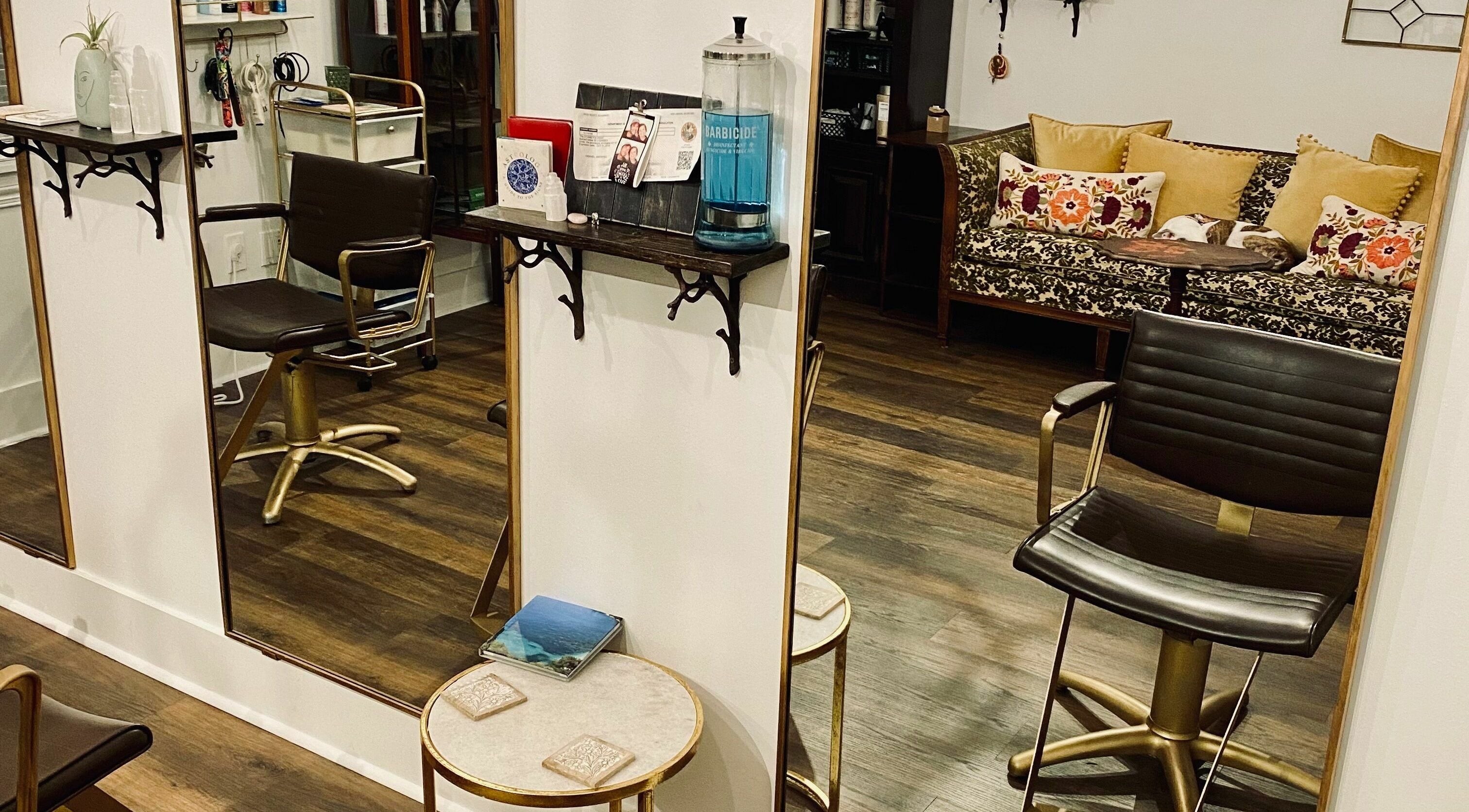 Elegant salon chair and decor at All The Things Salon and Wellness, Fort Myers, Florida, US.