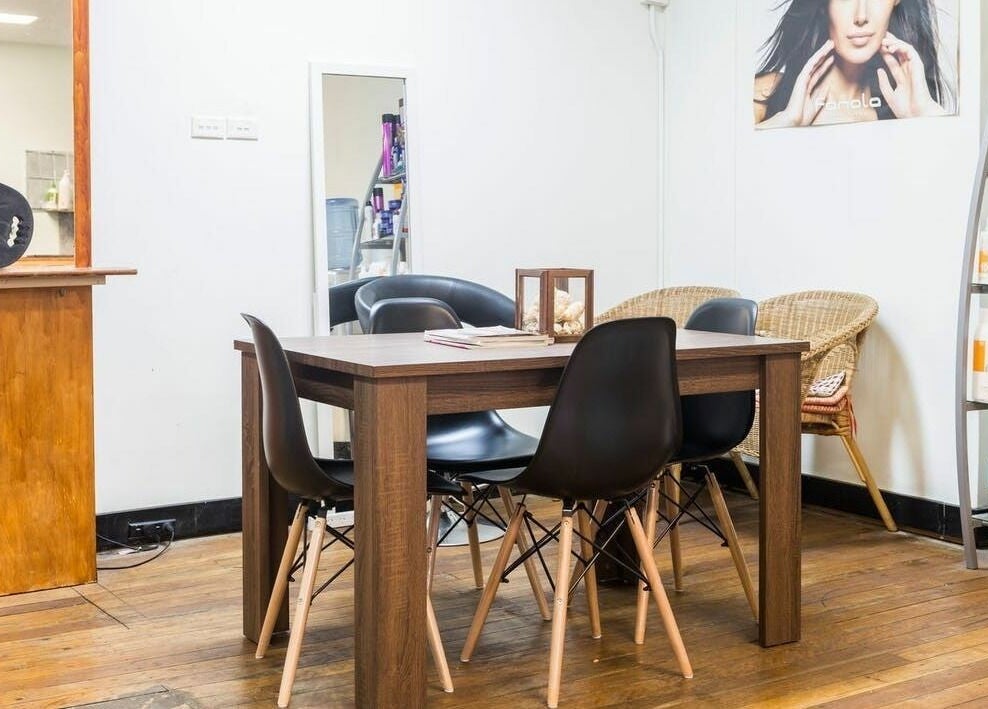 Warm and inviting seating area at Eton Place of Hairdressing, Sydney, New South Wales, AU.