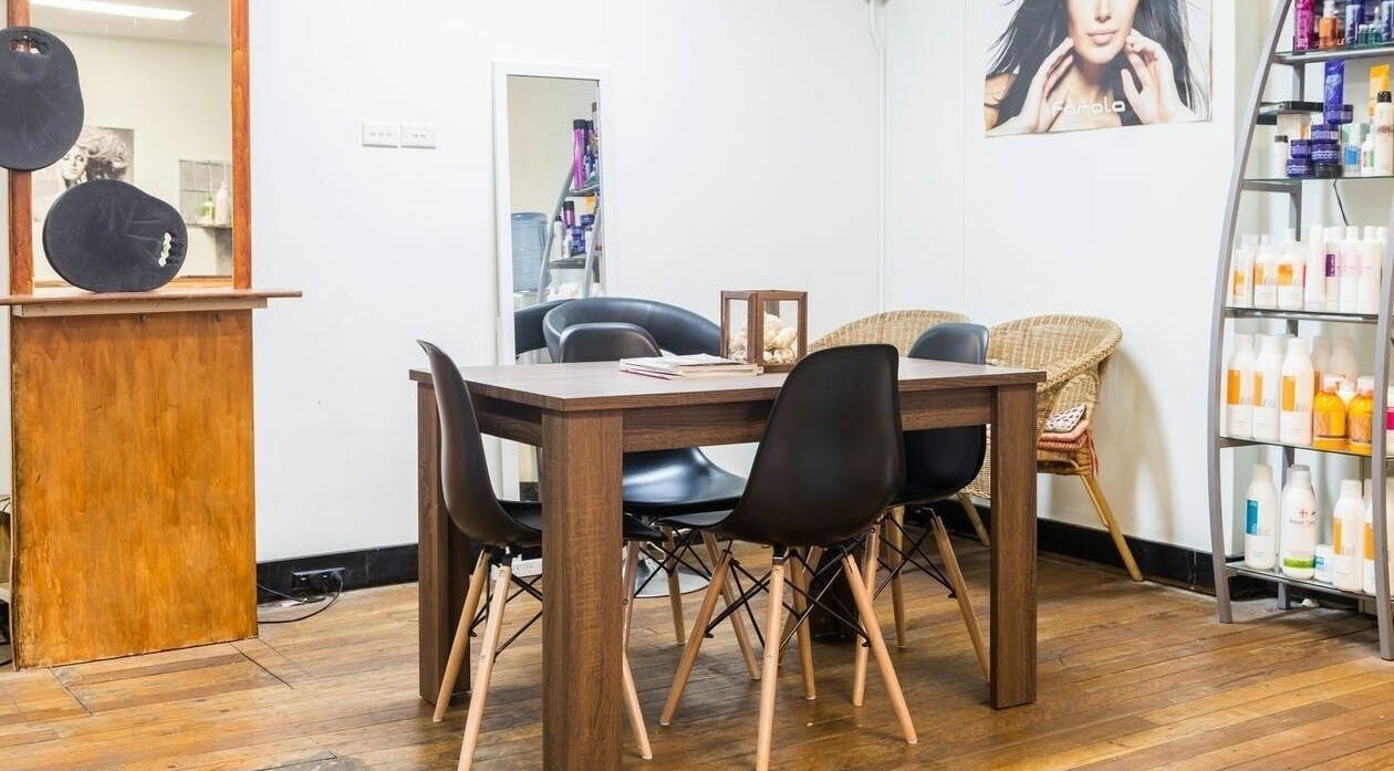 Warm and inviting seating area at Eton Place of Hairdressing, Sydney, New South Wales, AU.
