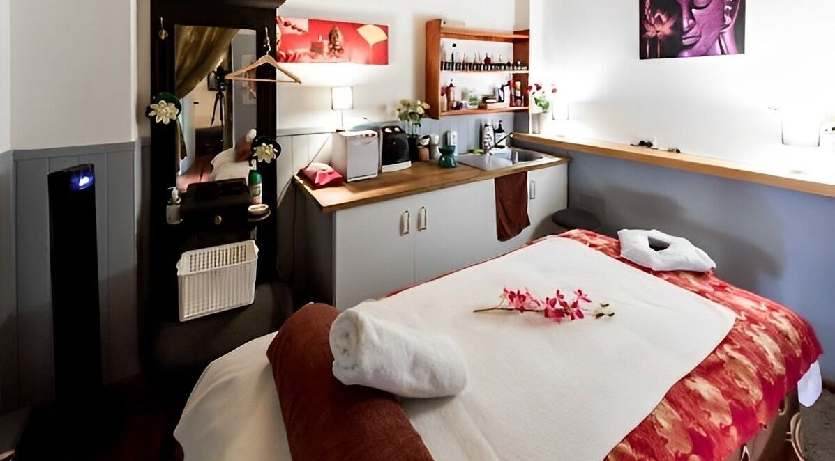 Cozy massage room at Beyonder Relax and Wellness, Paradise Point, Queensland, AU, with soothing decor.