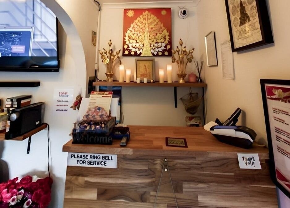 Reception area at Beyonder Relax and Wellness in Paradise Point, Queensland, AU, featuring serene decor and candles.