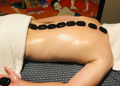 Hot stone massage at Youi Thai Massage in New Farm, Queensland, AU for relaxation and wellness.