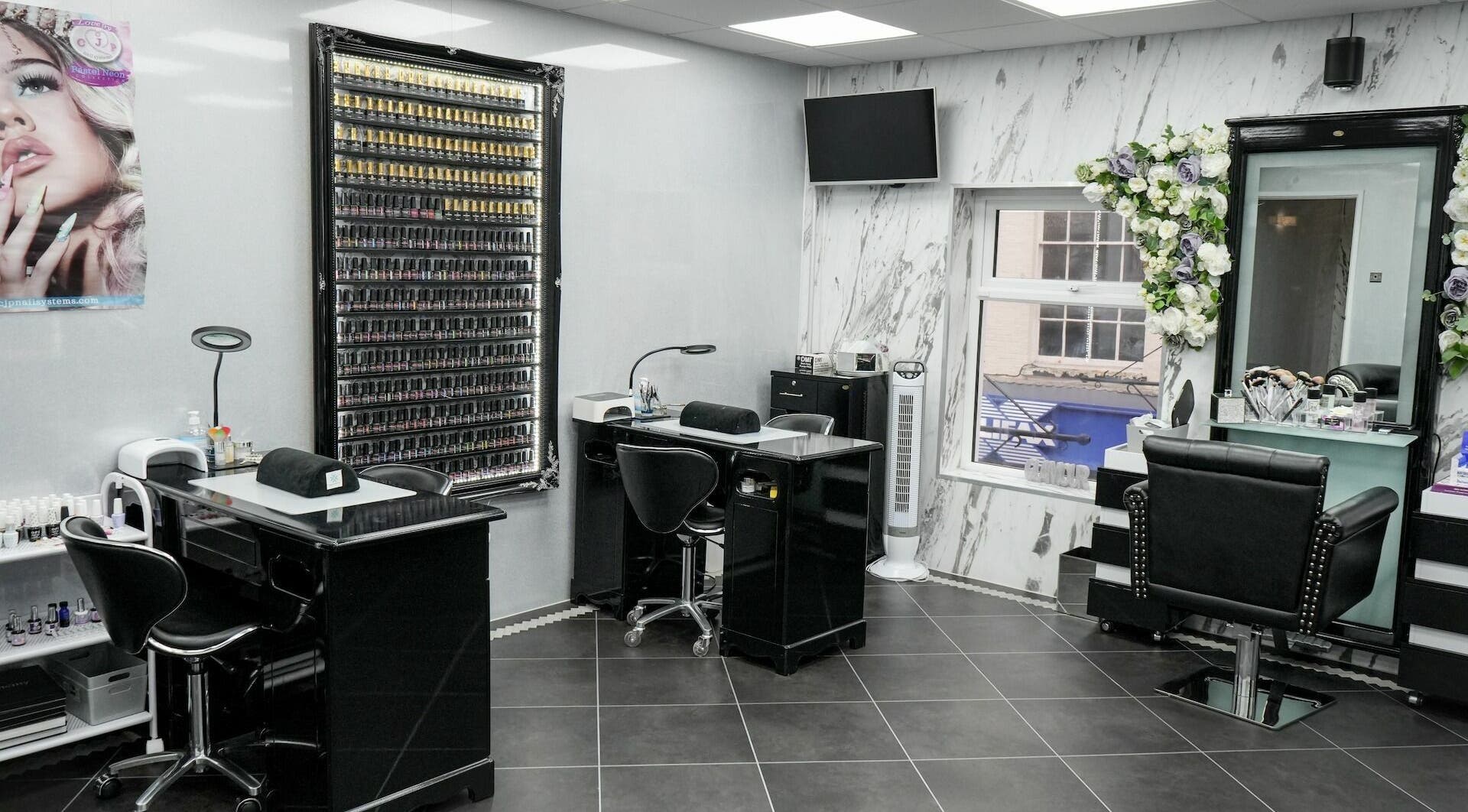 Bright Smiles Beauty salon interior in Bridgwater, England, GB featuring chic black and white decor.