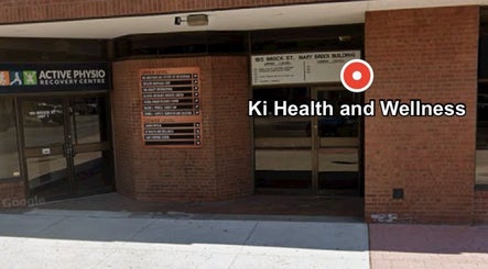 Exterior of Ki Health and Wellness, Whitby, Ontario, CA showing entrance with signage.