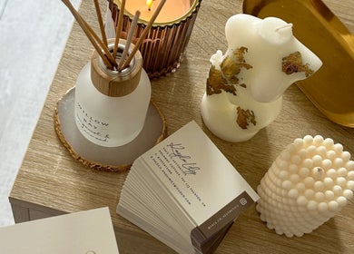 Stylish candles and business cards at Face Co Beauty and Aesthetics in Taunton, England, GB.