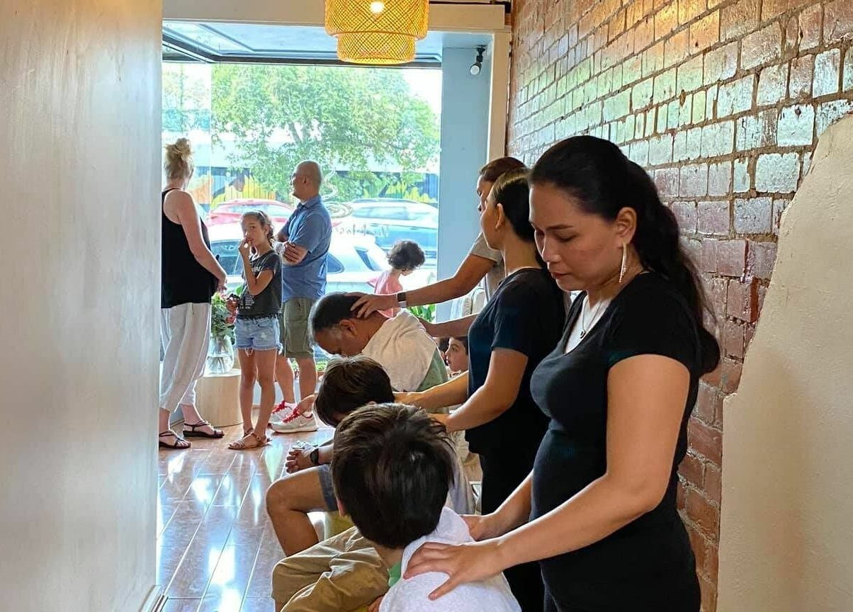 Guests relax with massages at The Massage Studio, Melbourne, Victoria, AU. A tranquil setting enhances the experience.