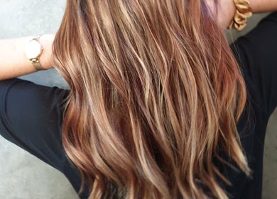 Beautifully styled hair at Mariska J Hairstylist in Pretoria, Gauteng, ZA, showcasing expert coloring.