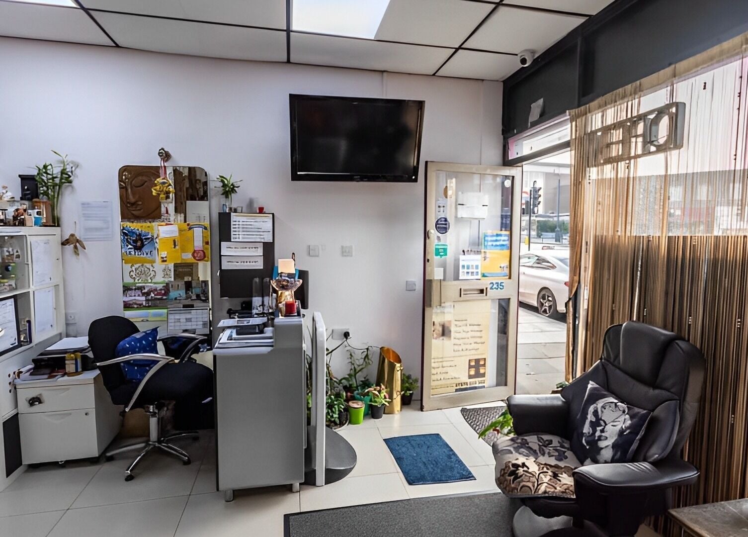 Warm, inviting reception area at Dee Therapy & Salon, Harrow, England, GB, showcasing a modern interior.