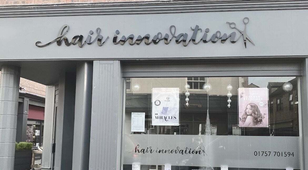 Front view of Beauty by Lucy at Hair Innovation in Selby, England, GB showcasing stylish salon signage.