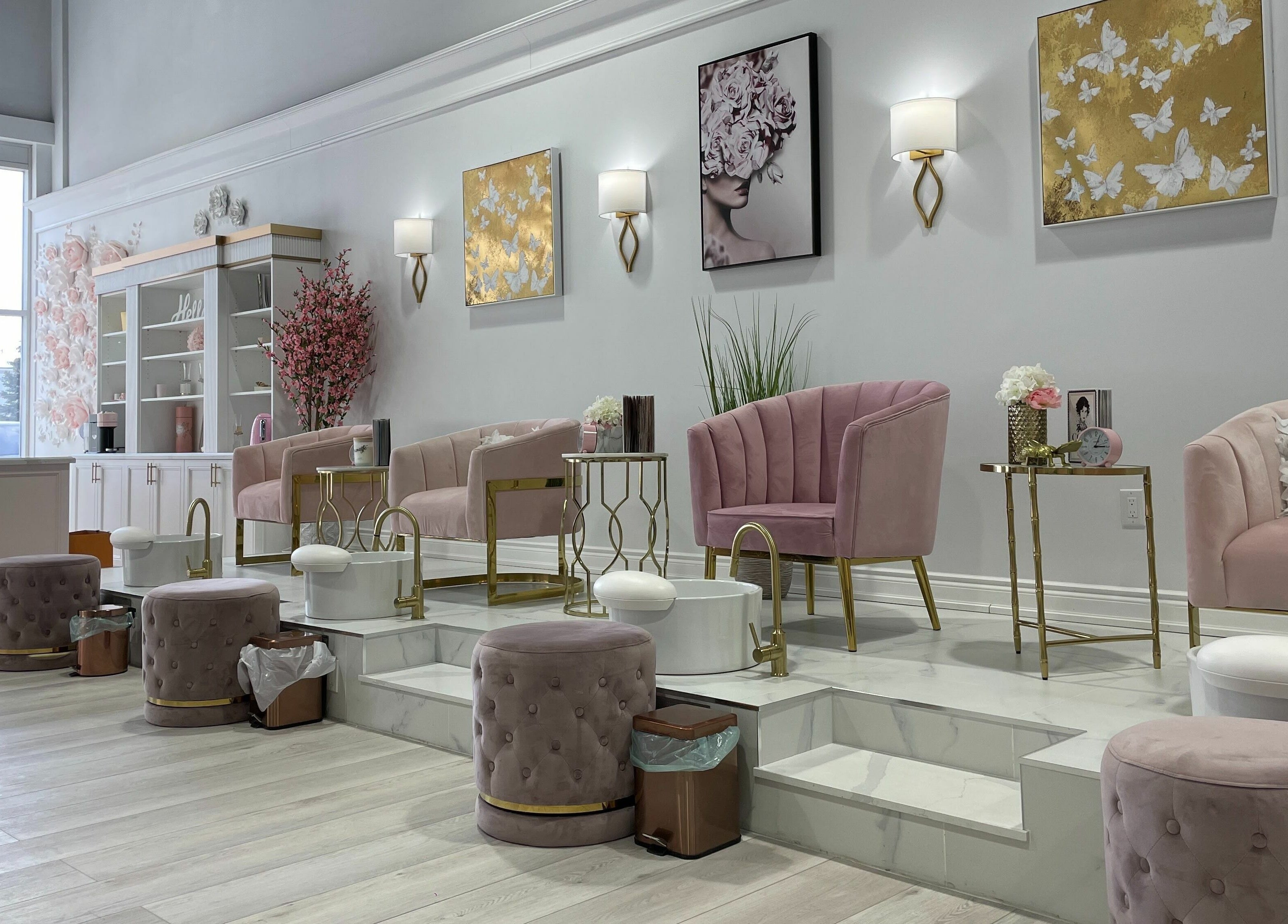 Chic interior of Nails a More Woodbridge, Vaughan, Ontario, CA, with plush pink seating and modern decor.