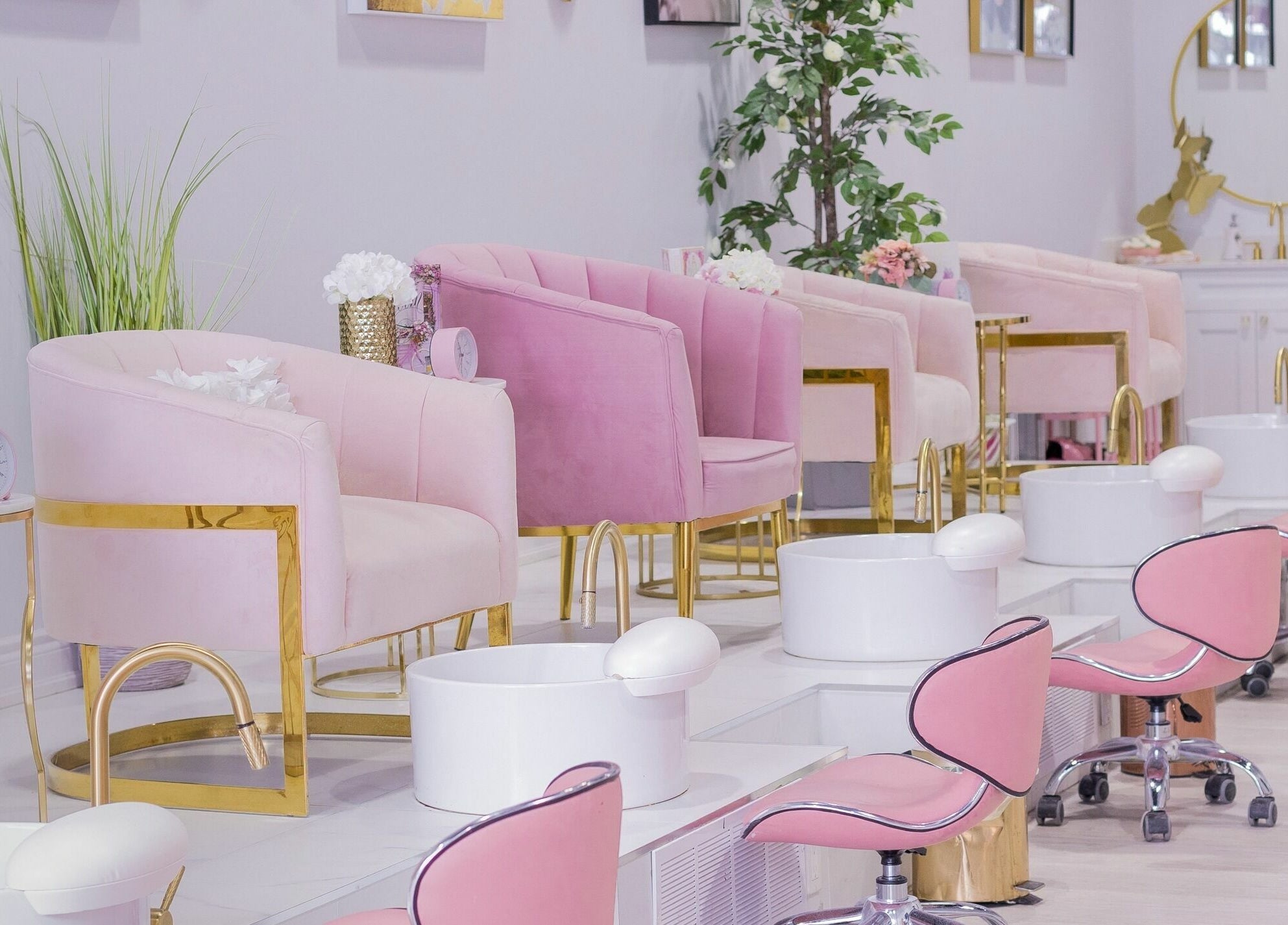 Stylish pink pedicure chairs at Nails a More Woodbridge, Vaughan, Ontario, CA, offering serene beauty atmosphere.