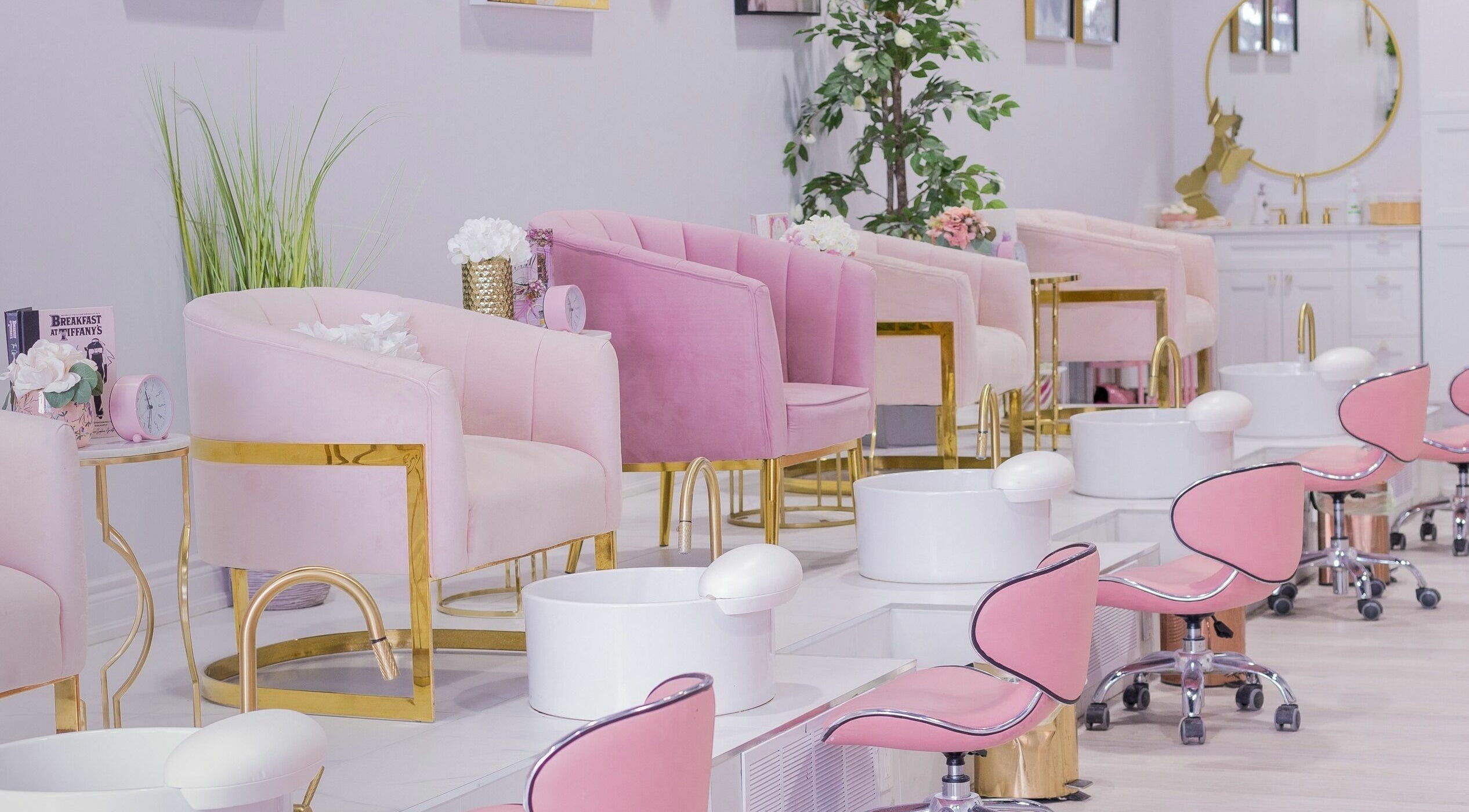 Stylish pink pedicure chairs at Nails a More Woodbridge, Vaughan, Ontario, CA, offering serene beauty atmosphere.