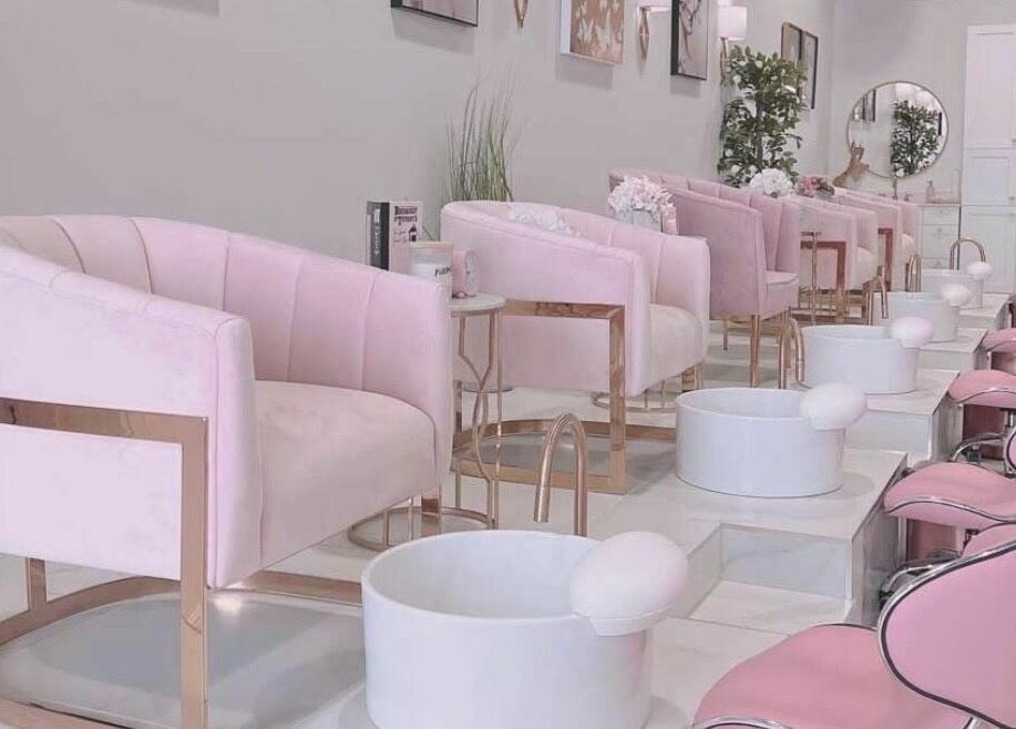 Luxurious pink pedicure chairs at Nails a More Woodbridge in Vaughan, Ontario, CA. Chic and inviting salon space.