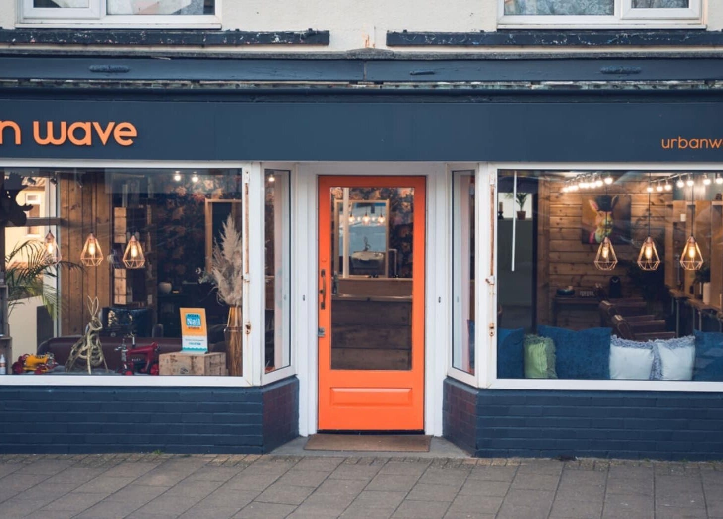 Exterior of Urban Wave, a stylish beauty salon in Northam, England, GB, showcasing modern decor and welcoming entrance.