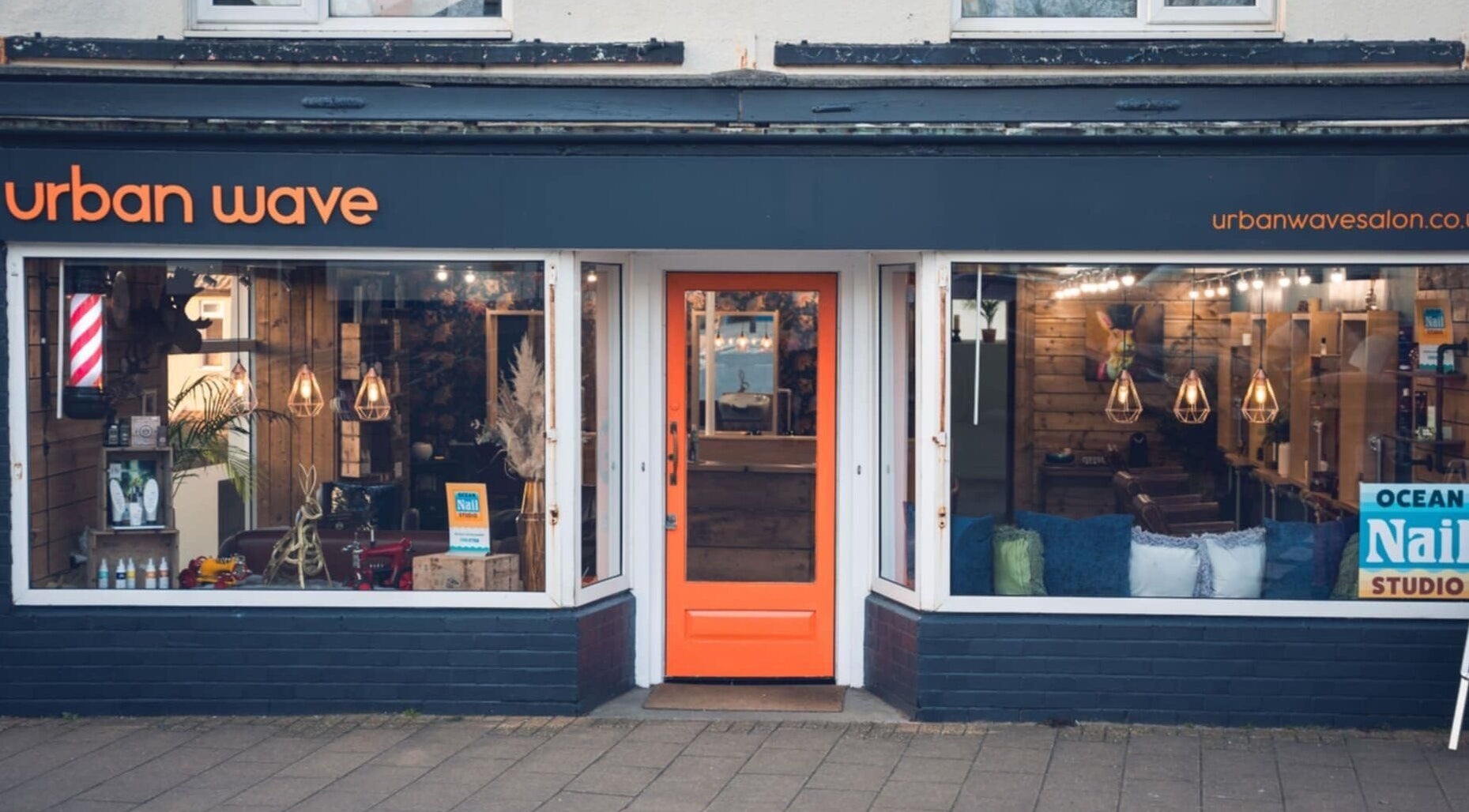 Exterior of Urban Wave, a stylish beauty salon in Northam, England, GB, showcasing modern decor and welcoming entrance.