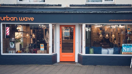 Exterior of Urban Wave, a stylish beauty salon in Northam, England, GB, showcasing modern decor and welcoming entrance.