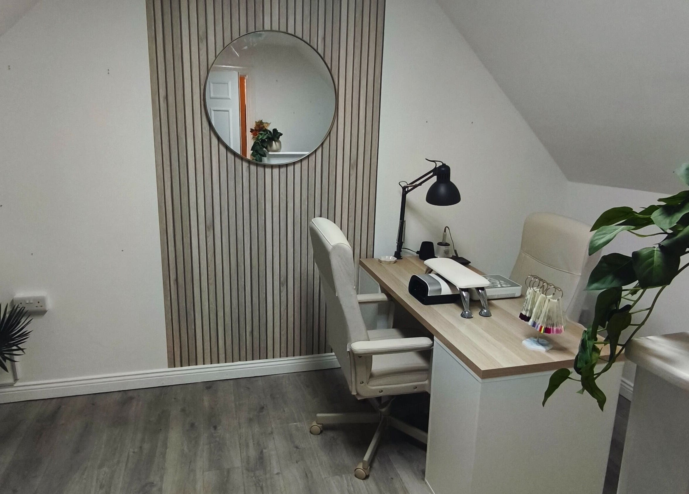 Modern nail studio at Sarah Dinan Nails, Ennis, County Clare, IE, featuring a sleek desk and stylish decor.