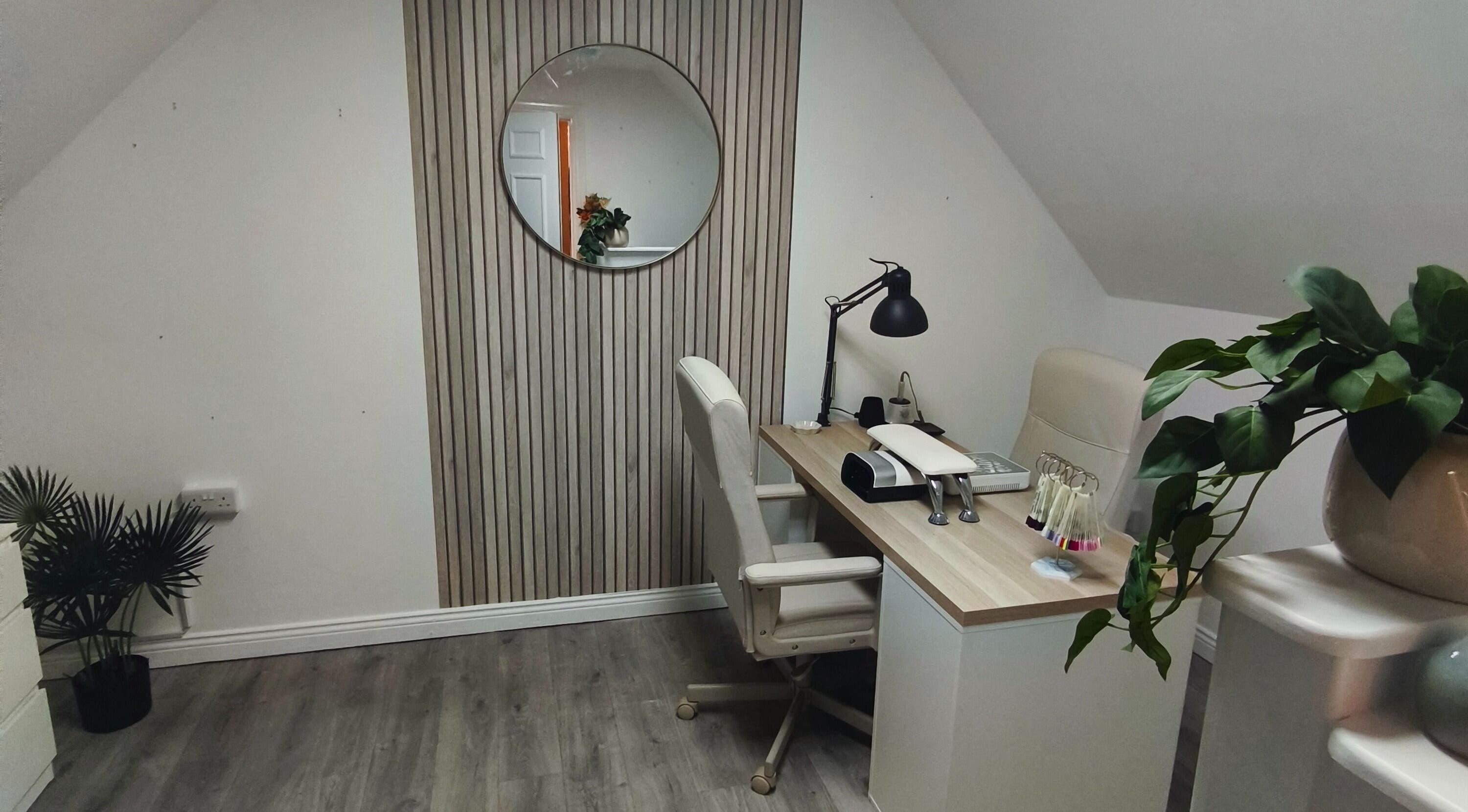 Modern nail studio at Sarah Dinan Nails, Ennis, County Clare, IE, featuring a sleek desk and stylish decor.
