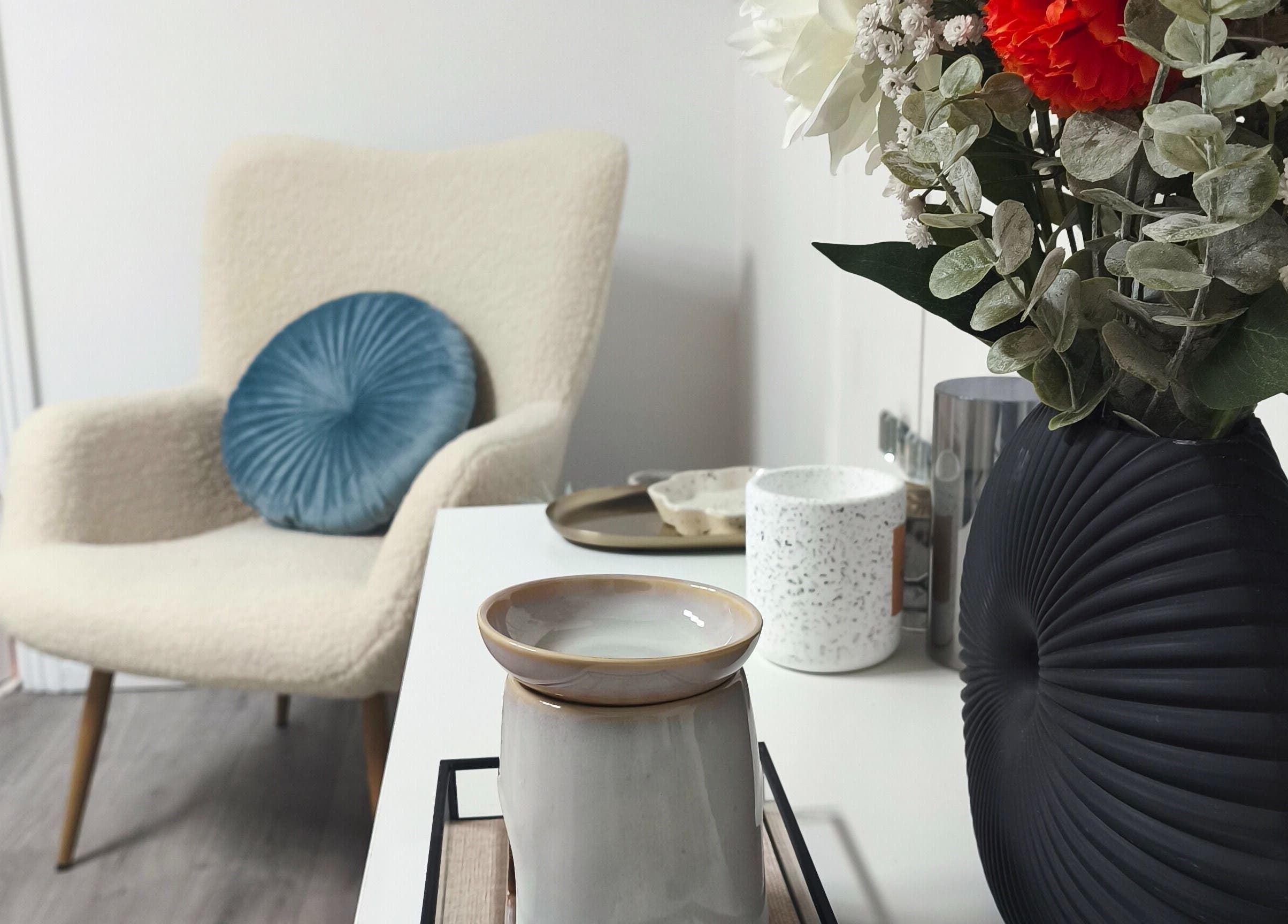 Cozy chair and floral decor at Sarah Dinan Nails in Ennis, County Clare, IE.