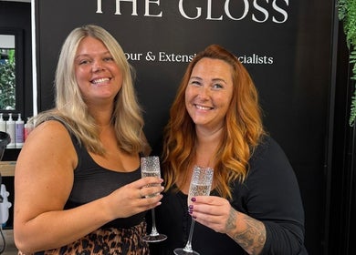 Smiling clients enjoying sparkling drinks at THE GLOSS, Lowestoft, England, GB.