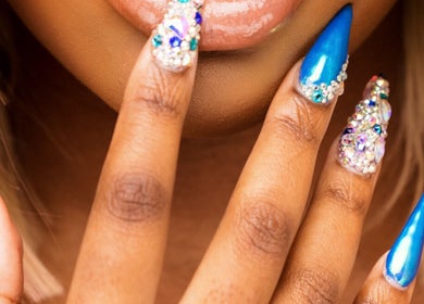 Stylish blue and gem nail art at Brown Sugar Nail Spa SUITE, Philadelphia, Pennsylvania, US.