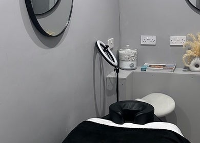 Cozy treatment room at Shxdy Skin Clinic, Manchester, England, GB. Modern decor with a relaxing ambiance.