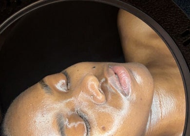 Facial treatment at Shxdy Skin Clinic, Manchester, England, GB, showcasing glowing skin under soft lighting.